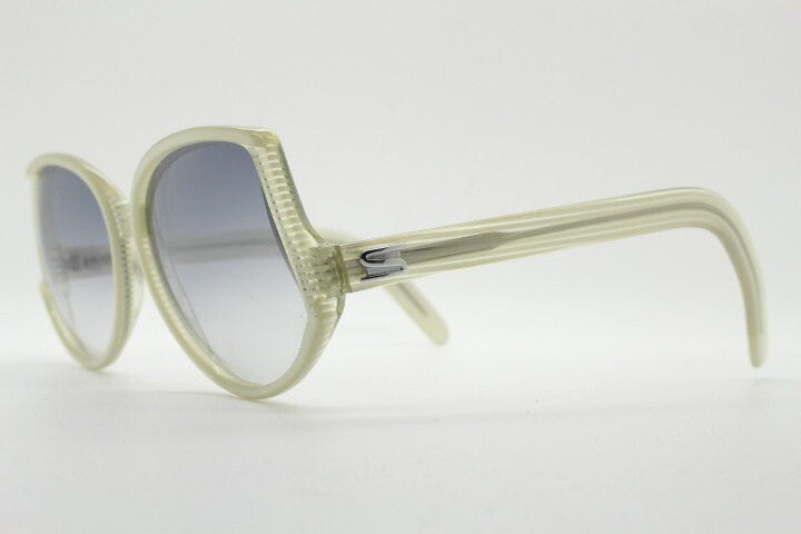 Silhouette 70s vintage abstract upside down sunglasses model 3018 made in Austria. Dynamic grey pearlised acetate frame with white stripes