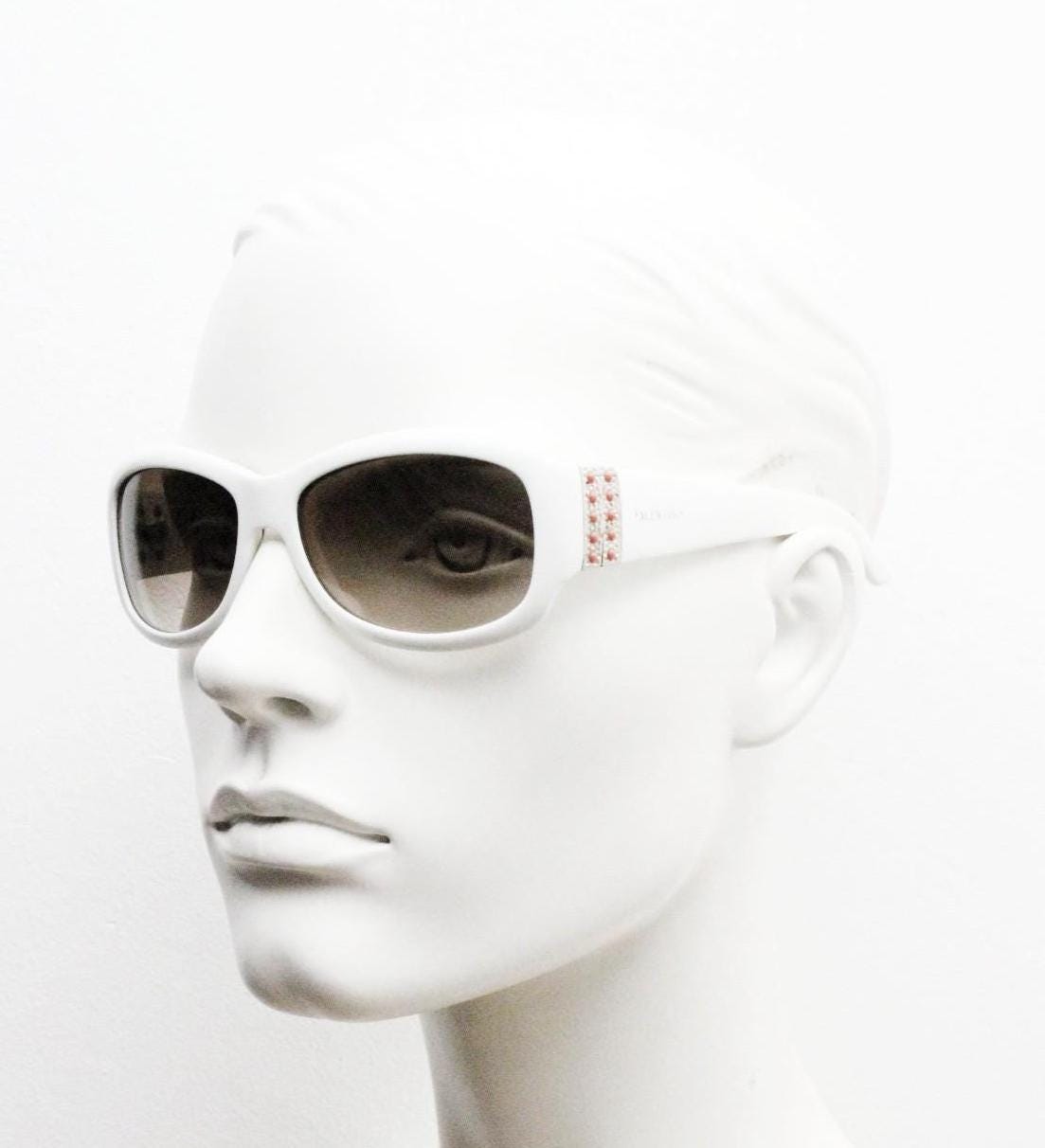 Valentino Y2k vintage wrap around bug eye sunglasses. Curving white acetate shield frame with orange and diamante stones. 2000s. Rhinestone