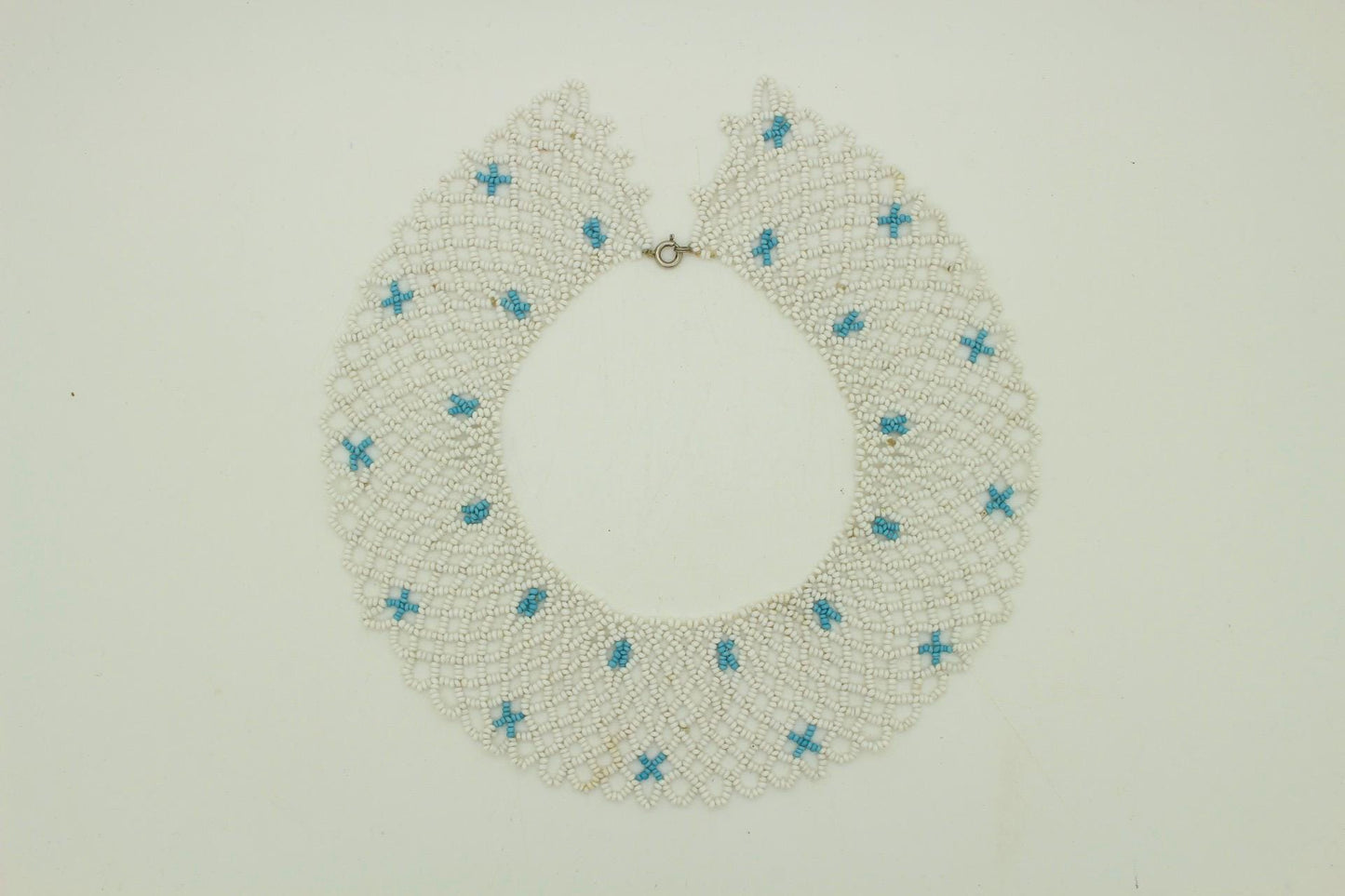 80s vintage beaded lattice collar necklace. Small white beads mixed with blue "x" patterns. Womens large versatile choker. Unused NOS