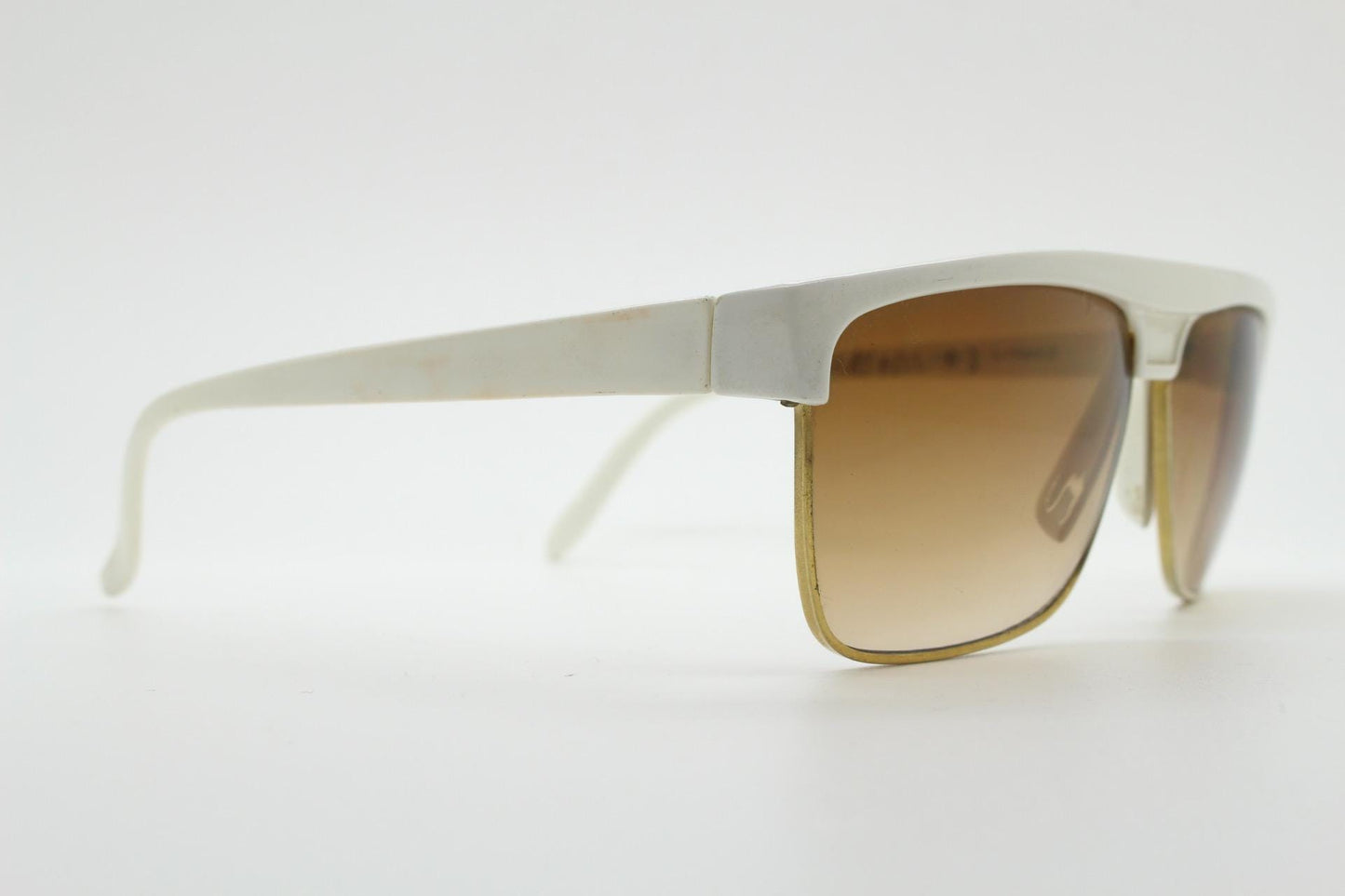 Pierre Leman Paris 80s vintage rectangular sunglasses made in France. Ice white flat top half frame with brown graduating lenses