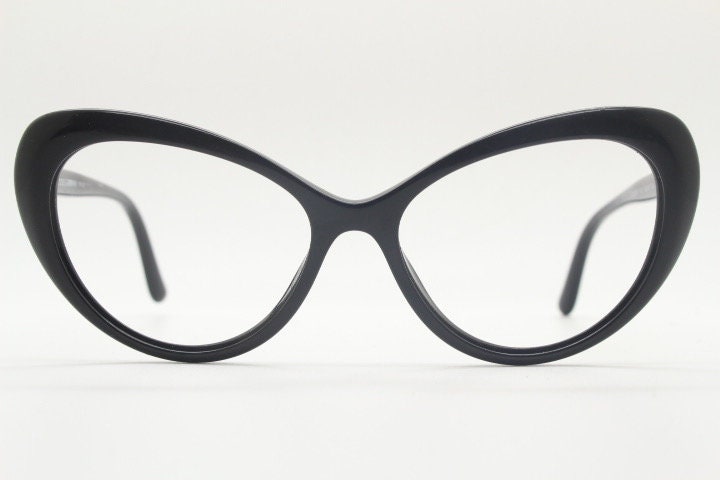 Dolce Gabbana oval cat eye glasses made in Italy. Stylised black gloss acetate optical frames. Womens prescription vintage cateye. RX pin up