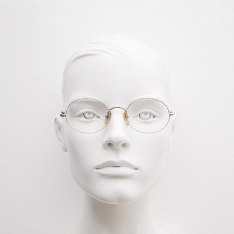 Giorgio Armani 90s vintage oval eye glasses made in Italy. 30s design gold optical frames in a satin finish. Prescription RX
