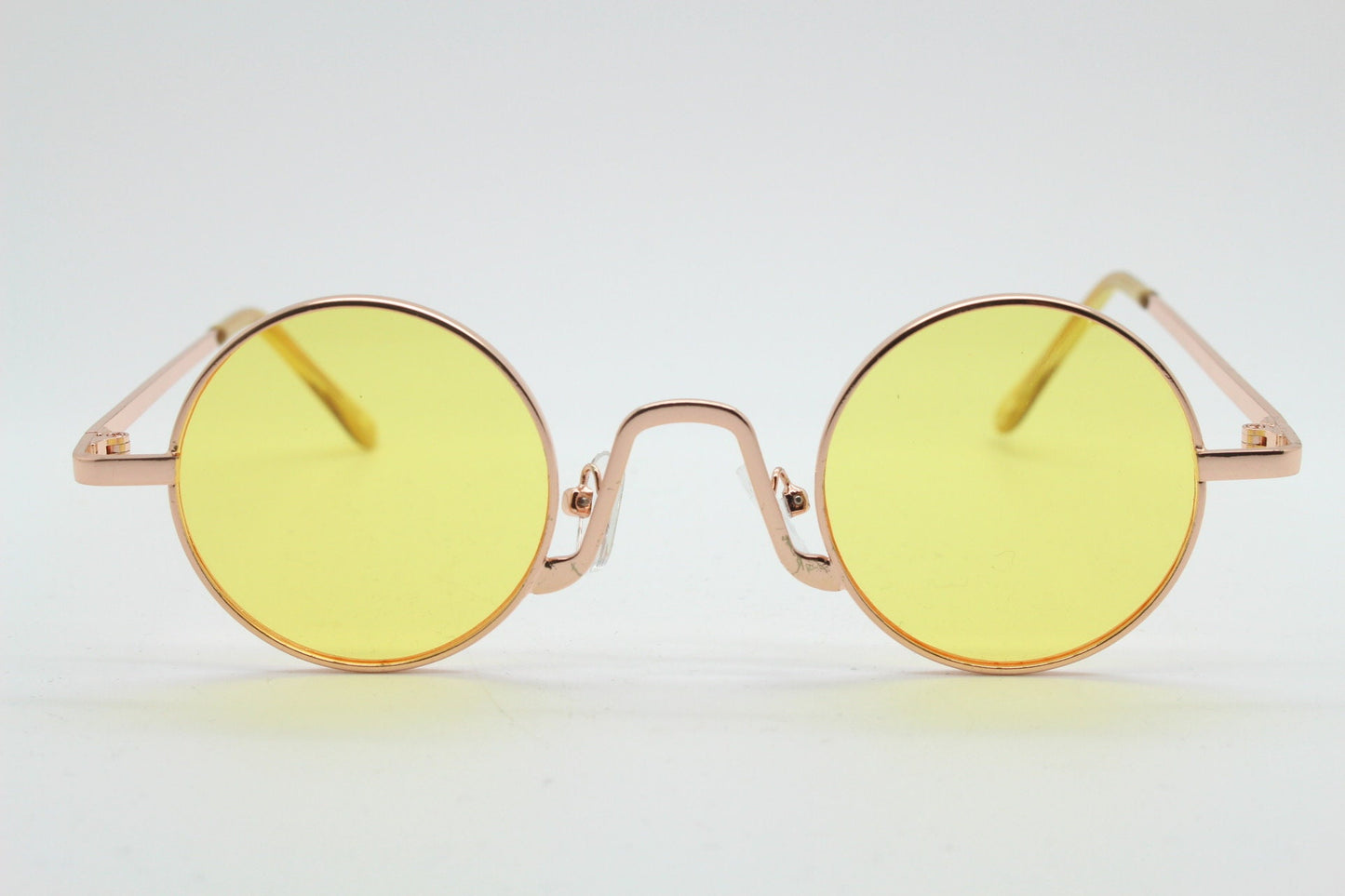 90s vintage small oval sunglasses. Imposing minimal gold victorian style frame with blazing canary yellow lenses. Steampunk. Unused BNWT