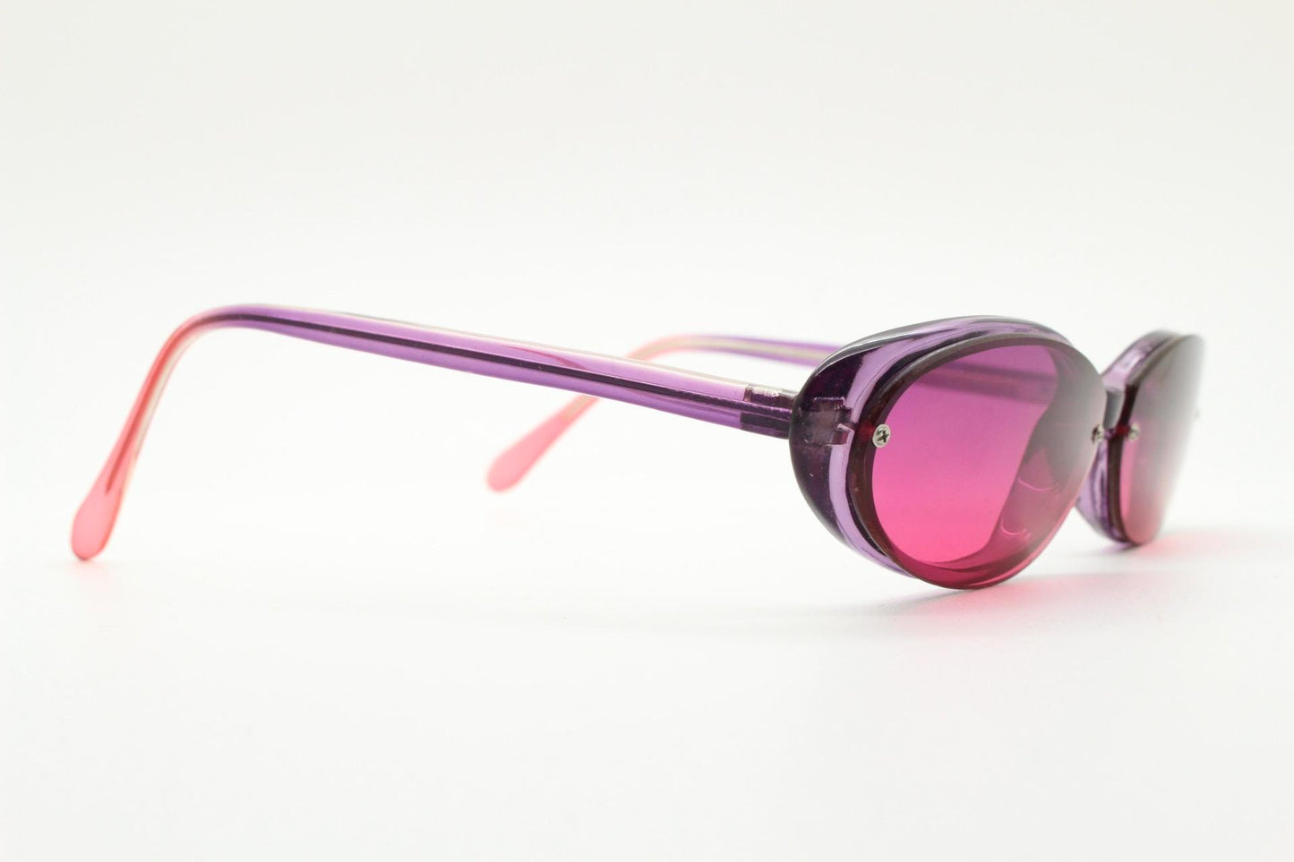 Vintage 90s oval cat eye sunglasses. Low profile Womens transparent purple frame with intense pink lenses. Rockabilly cateye. Unused NOS