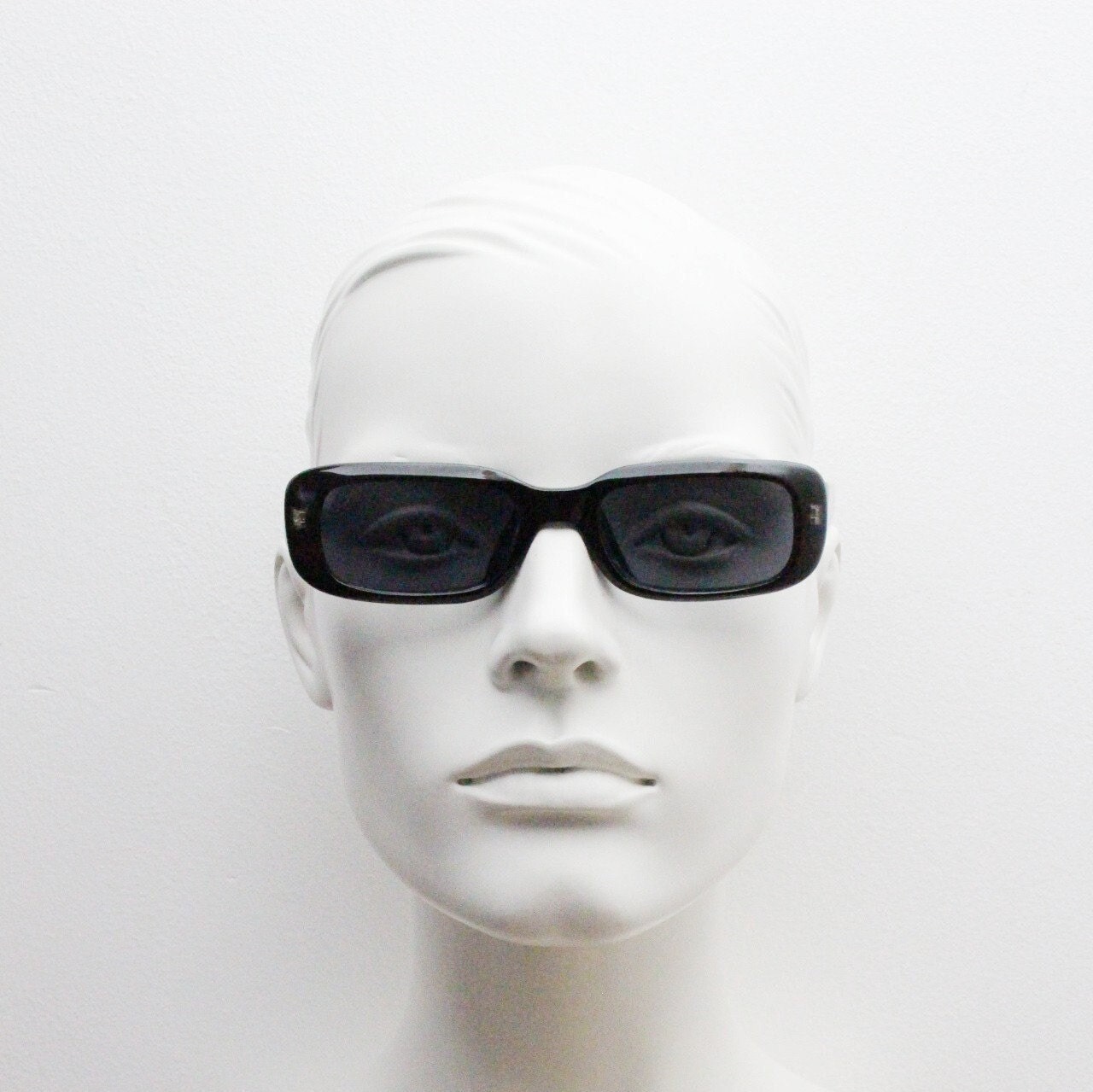 90s authentic vintage abstract rectangular sunglasses. Thickened black frame with red crackle print. NOS