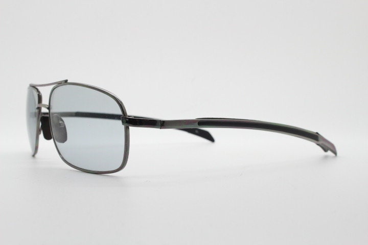90s vintage modified rectangular aviator sunglasses. Gunmetal chrome frame aviators with light tone smoky grey lenses. Unused NOS