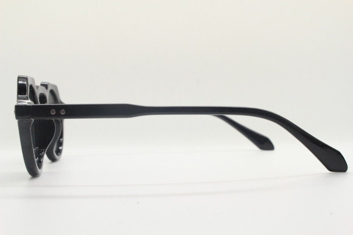 90s Vintage round flat top sunglasses. 30s, 40s design in black gloss frame with plain dark lenses. Unused NOS
