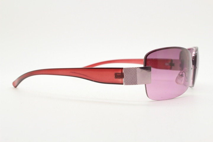 Y2K vintage big rectangular sunglasses. Half frame 2000's wrap around with purple curved lenses and matching purple chrome trim. 00's