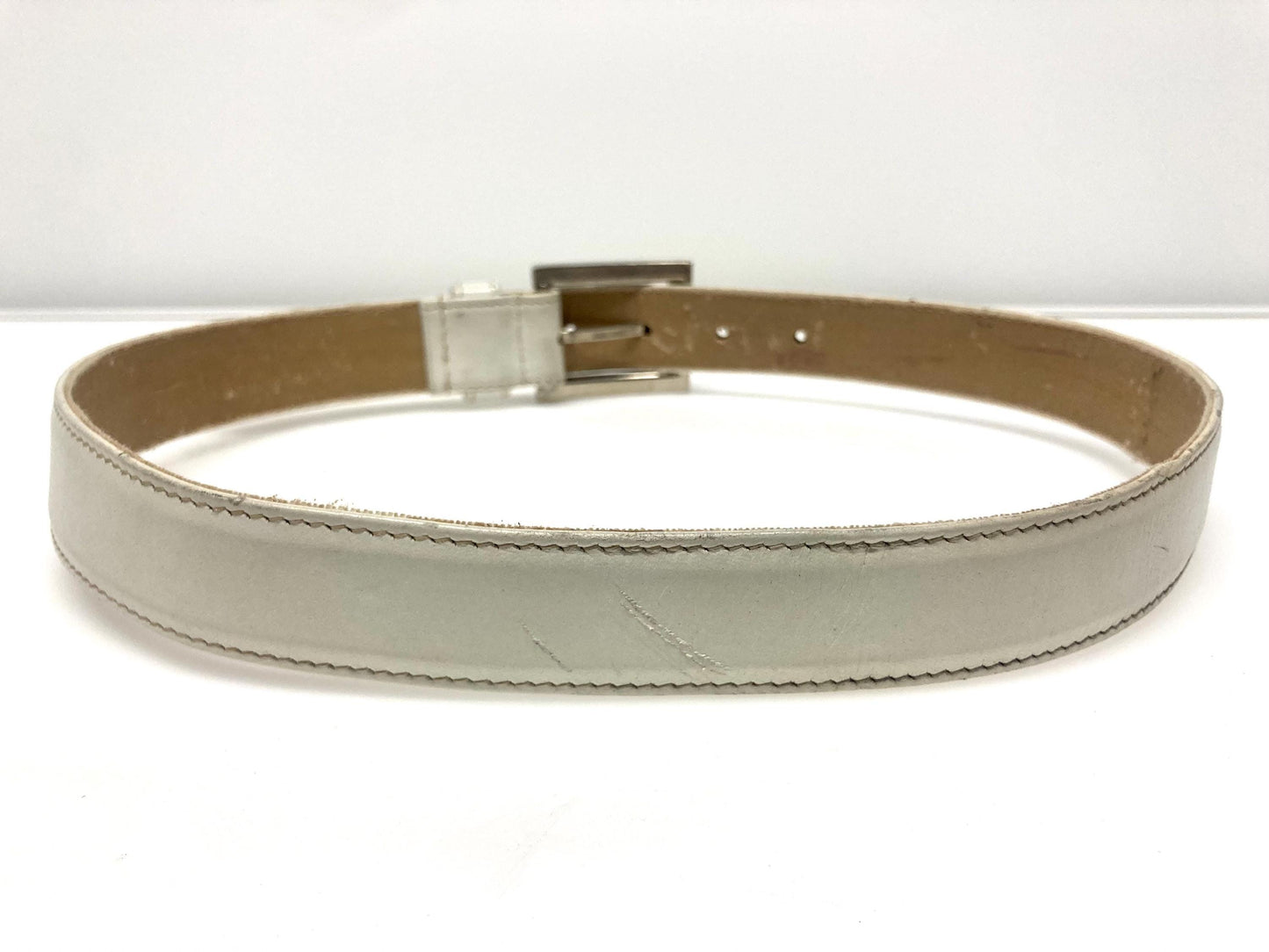 90s vintage womens dress or jeans belt by French Connection. Plain white genuine leather with chrome solid brass buckle. Made in England