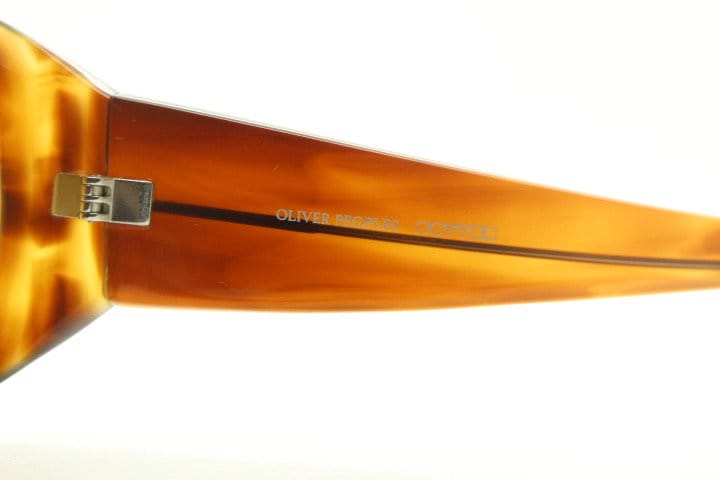 Oliver Peoples vintage Y2K wrap around sunglasses model Vanadis made in Japan. Big bug eye with tall arms in mottled brown acetate frame