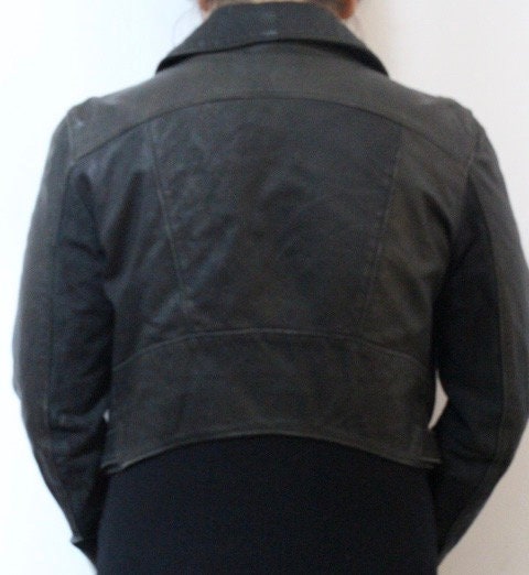 Diesel black fitted womens motorcycle jacket. Genuine leather cropped biker design with fixed adjustable belt. Over 30% sale rrp 469 GBP