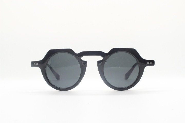 90s Vintage round flat top sunglasses. 30s, 40s design in black gloss frame with plain dark lenses. Unused NOS