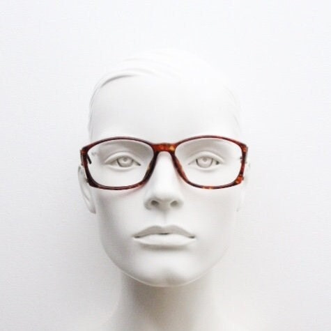 Christian Dior 80s vintage rectangular eye glasses made in Germany from Optyl. Striking marbled amber acetate optical frame. Prescription RX