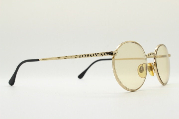 Vogue women's round eye glasses made in Italy. Gold chrome panto optical frame with indented diamond patterns. Prescription RX spectacles