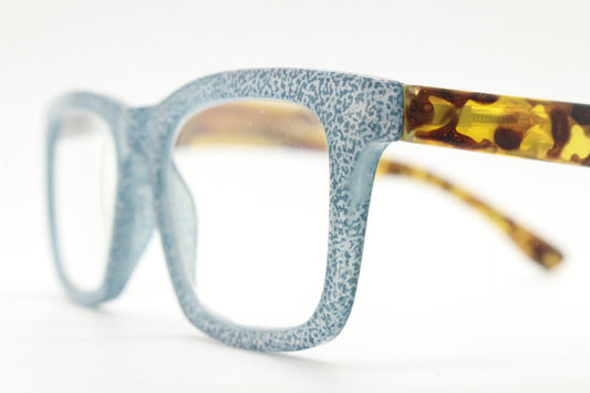 Rectangular Y2K horn rim eye glasses. Contrasting tortoise arms and speckled blue denim look optical frames. Prescription vintage spectacles
