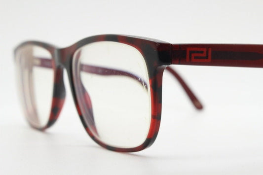 Versace modified wayfarer design eye glasses made in Italy. Mottled brown acetate optical frames with subtle logo. Prescription eyeglasses