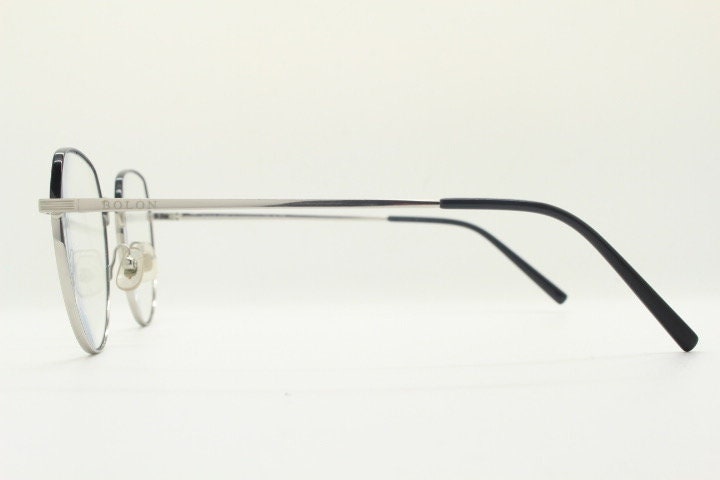 Bolon round panto flat top eye glasses model 7052. Slender silver metal optical frame with black brow. Prescription spectacles. Vintage RX