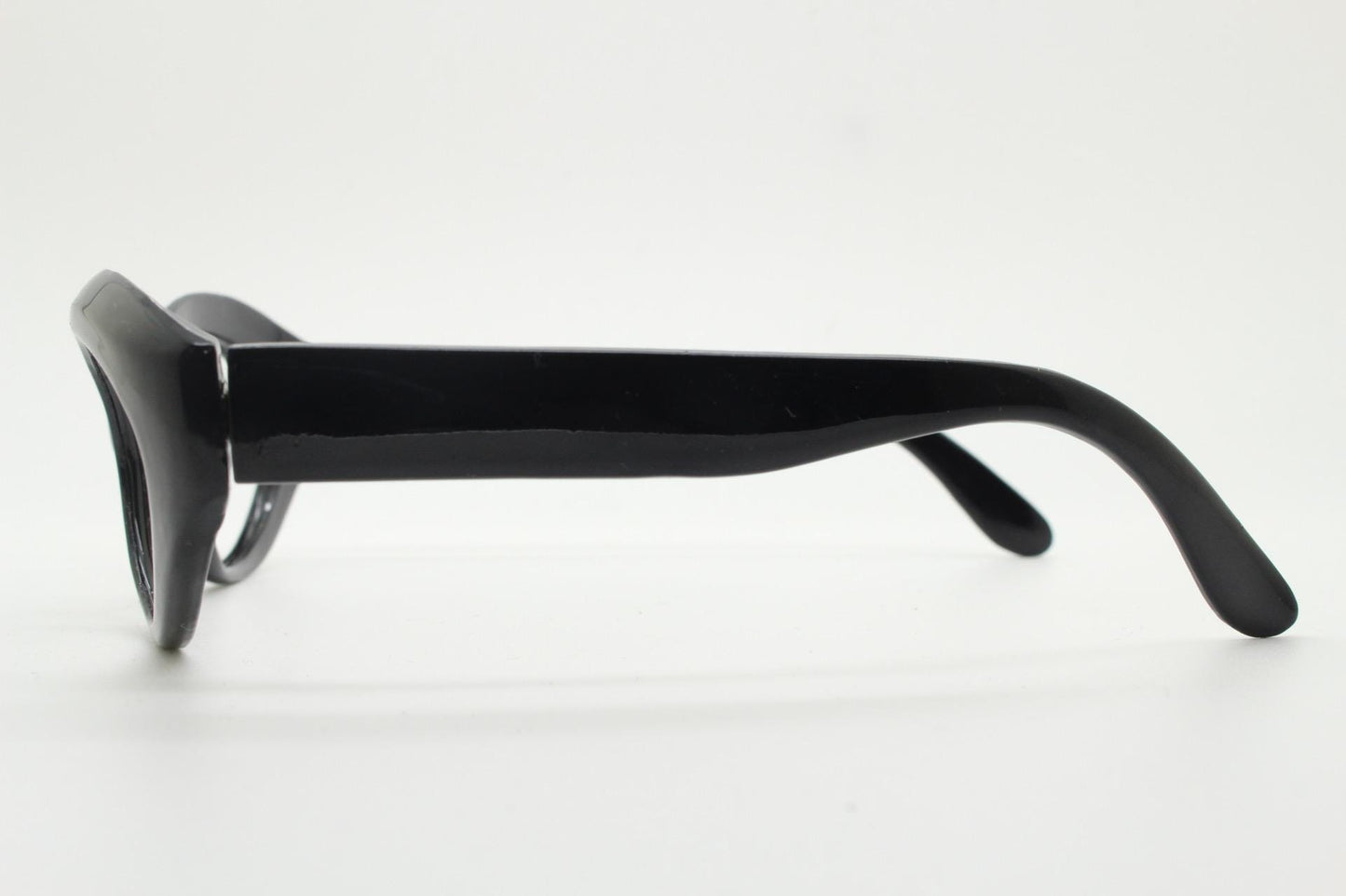 80s vintage oval cat eye glasses. Crop sided dynamic black cateye optical frames. 60s design prescription eyeglasses. RX spectacles. NOS