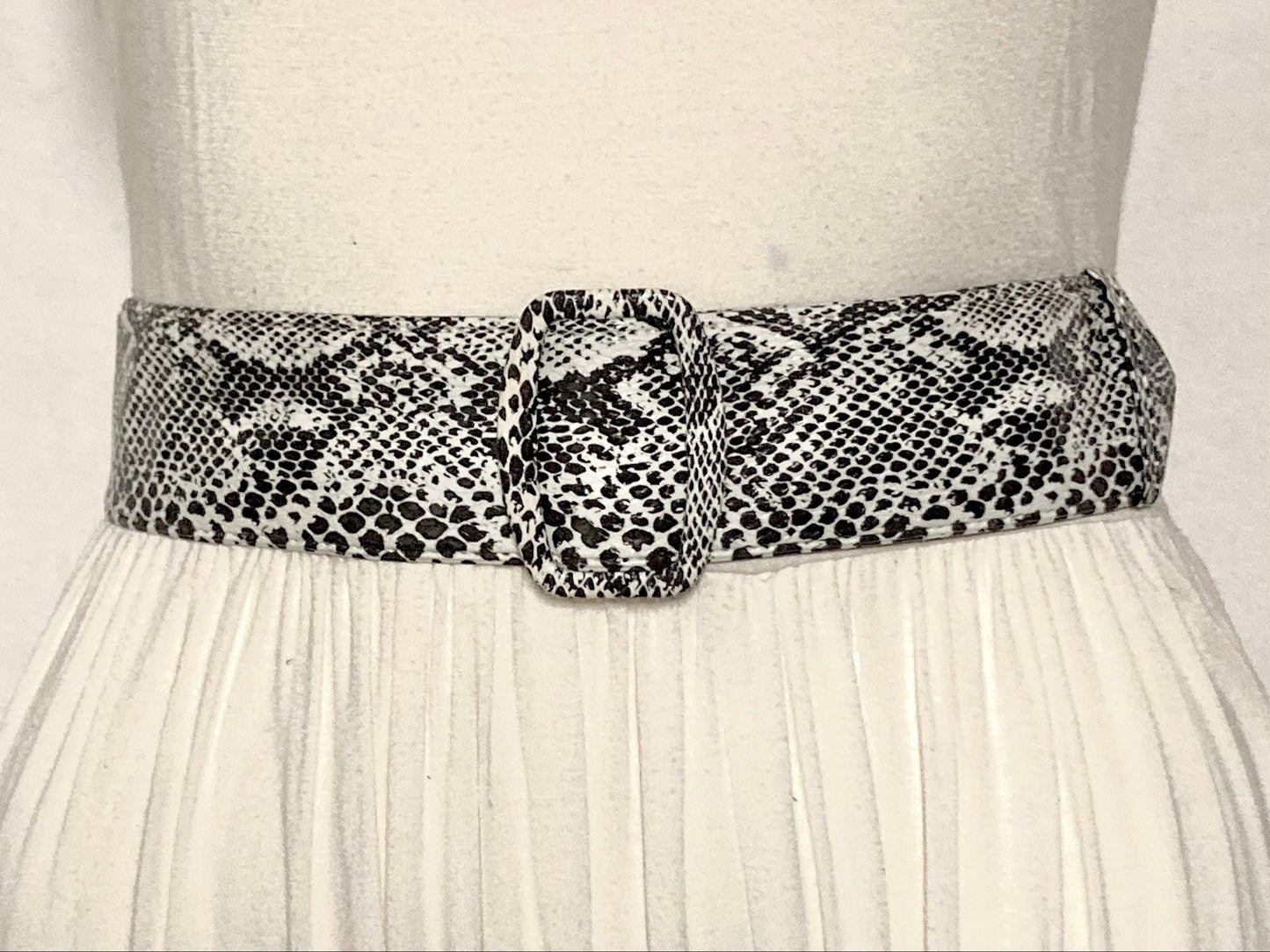 80s vintage womens clean black and white rattle snake 2" belt. Neat flat vinyl design that stays in position. For dress feature. Unused NOS