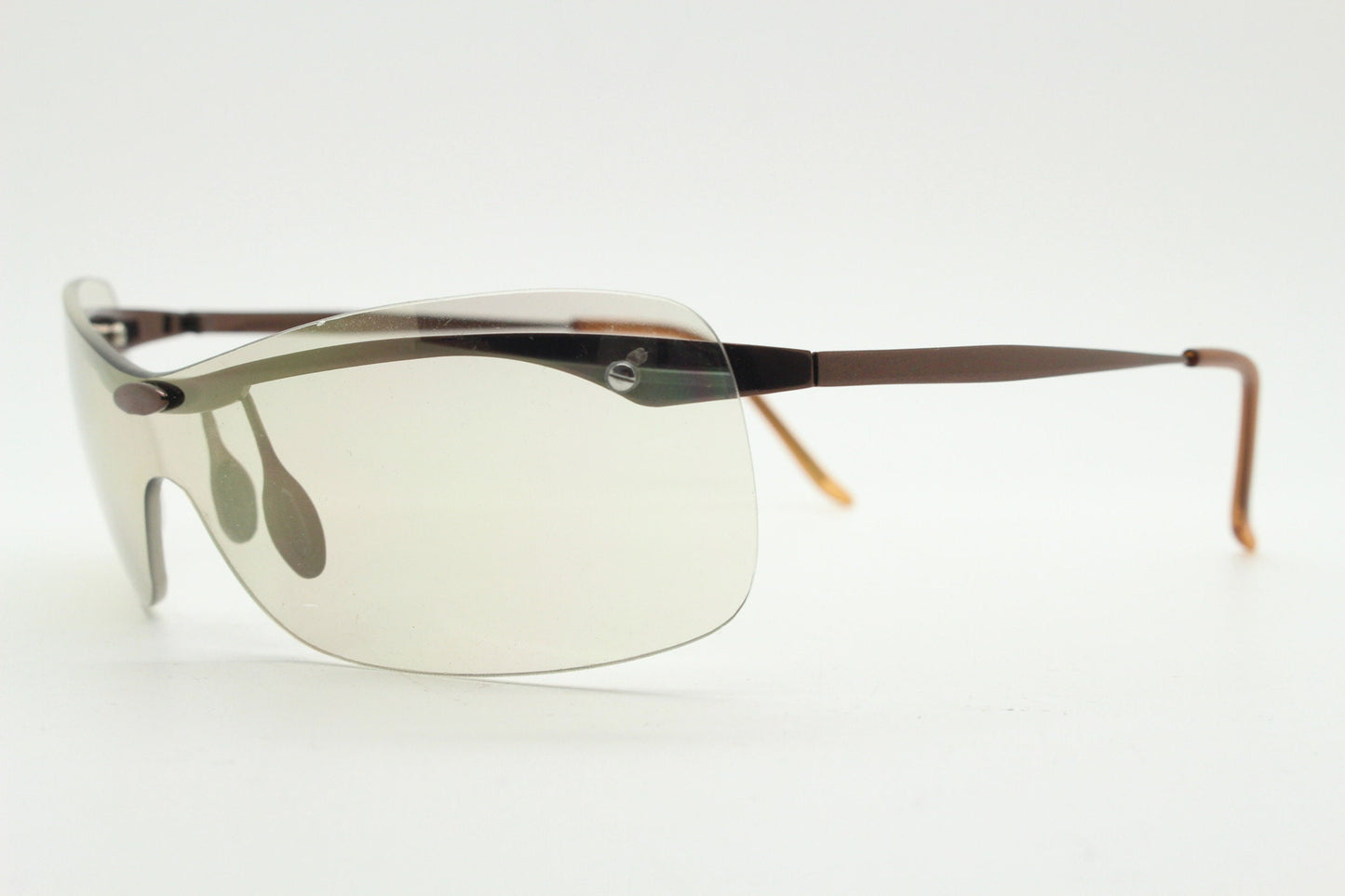 Y2K vintage visor sunglasses. 2000's wrap around sport shield design. Brown chrome brow with light tone lens. NOS 00's. 90S
