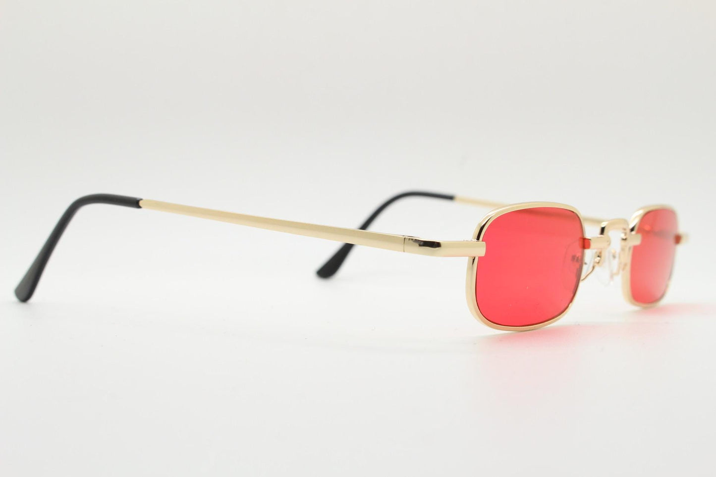 90s vintage small rectangular sunglasses. Imposing minimal gold metal victorian style frame with deep red lenses. Unused BNWT