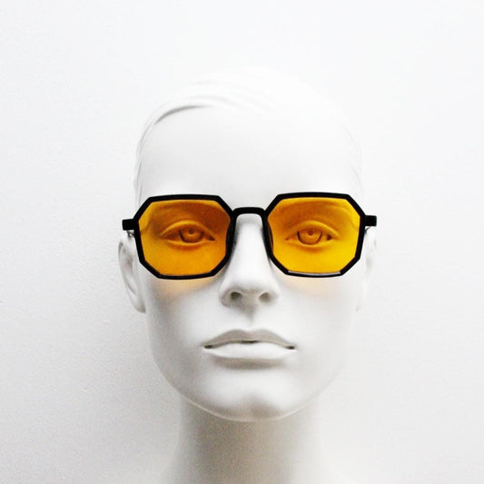 Vintage octagon sunglasses. Well proportioned subtle 8 sided black gloss frame with intense orange lenses. Rave. BNWT. NOS