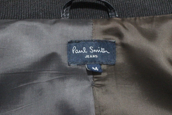 Paul Smith high collar bomber jacket. Plain black lambskin minimal flap pocket mens zipper. Ribbed collar. Size Medium