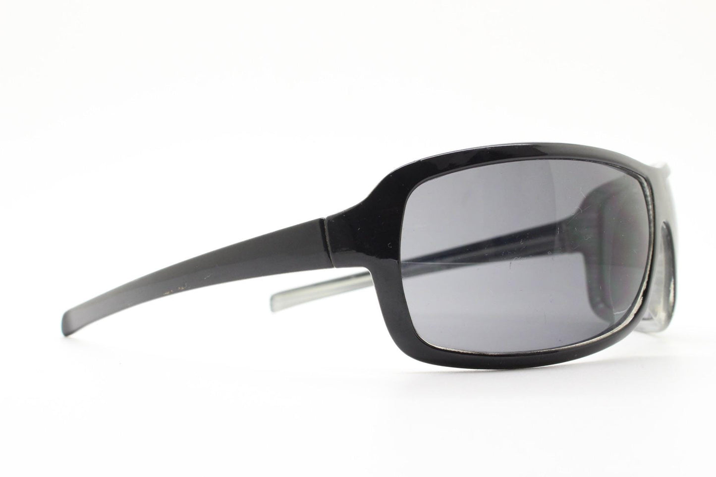 Y2k vintage wrap around large square sunglasses. Curved black shield frame with tasteful striped interior. 1960s bug eye design. 2000's NOS
