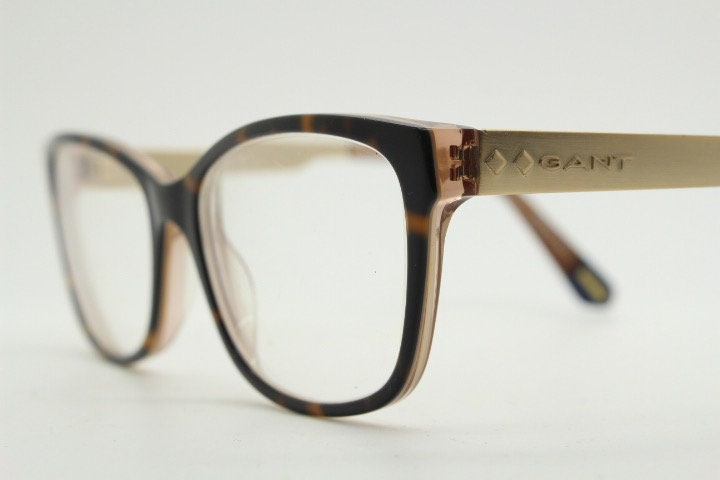 Gant vintage modified cat eye glasses model 4060. Tortoise acetate and satin metal arm cateye optical frames. Womens prescription spectacles