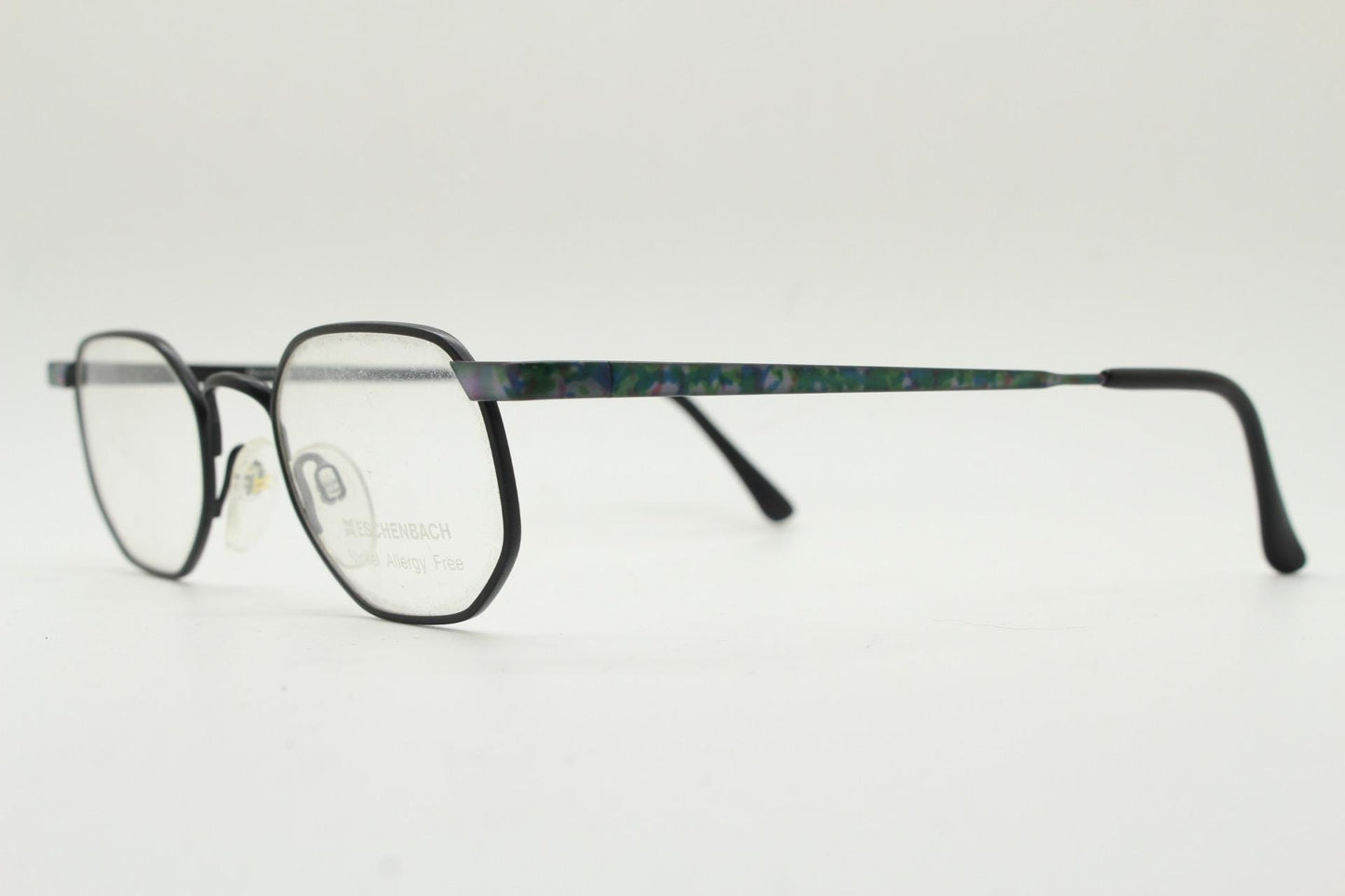 Eschenbach 90s vintage angular octagon eye glasses. Sharp matt black optical frame with blue marbled arms. Prescription RX spectacles. NOS