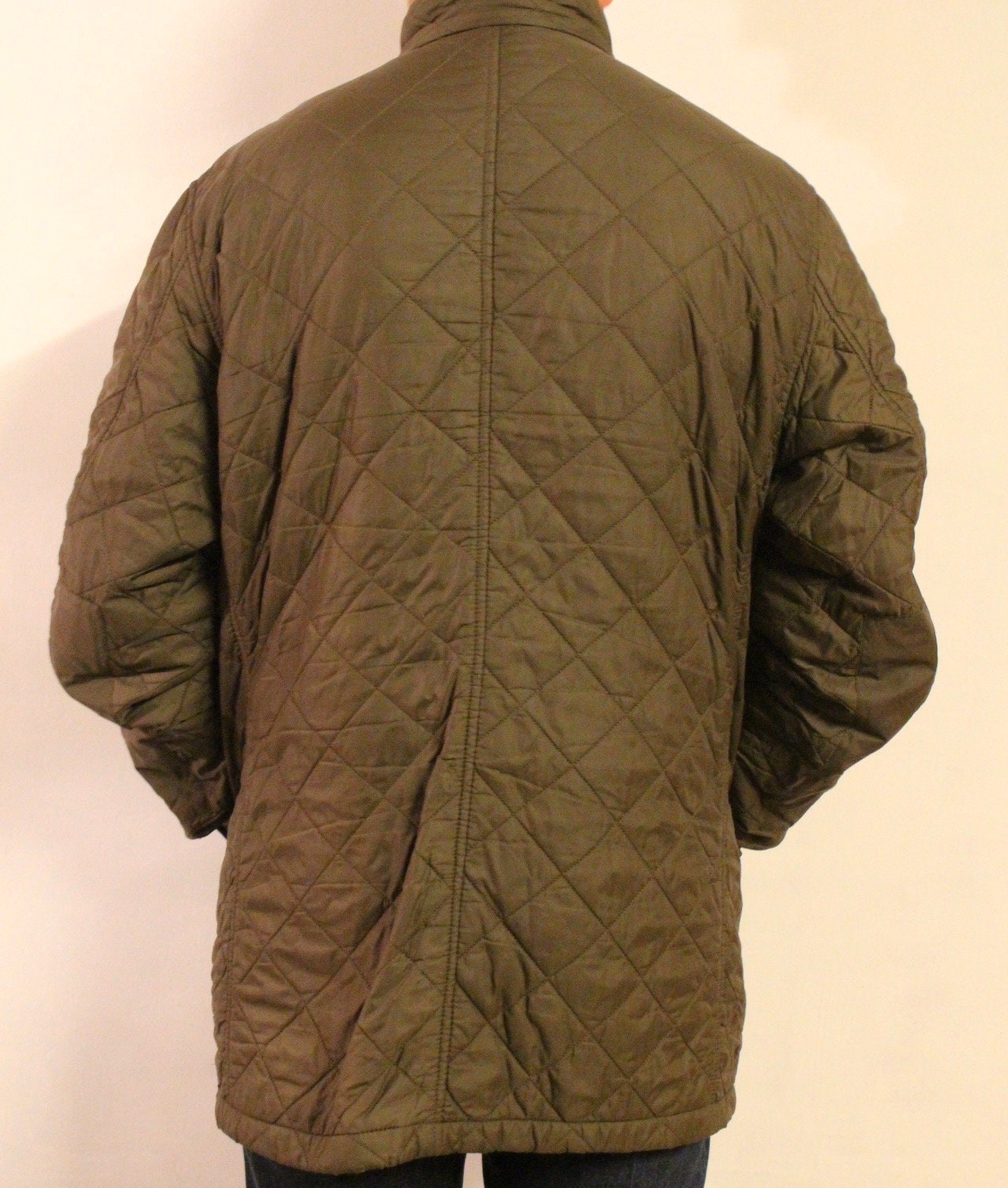 Barbour vintage quilted three quarter length 4 pocket round neck jacket. Khaki green M65 design with stamped stud buttons. Size L