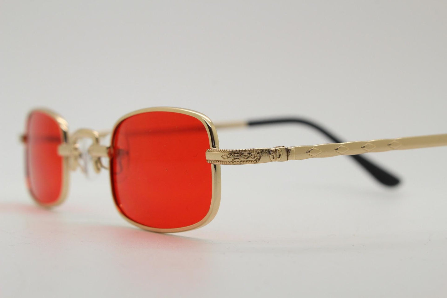 90s vintage small rectangular sunglasses. Imposing minimal gold metal victorian style frame with deep red lenses. Unused BNWT