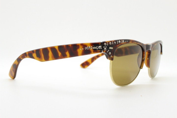80s vintage browline diamante sunglasses. All time classic design in tortoise gloss with gold half rim and rhinestones. 50s rockabilly