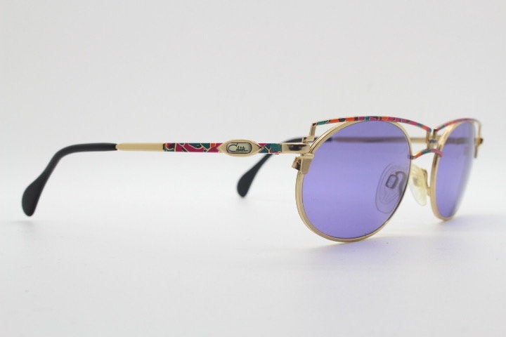 Cazal 90s vintage sunglasses made in Germany. Dynamic multi colour enamelled frame with custom ordered unique purple lenses