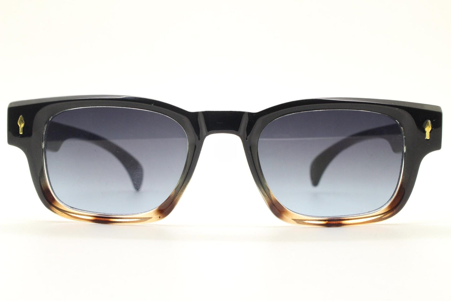 Vintage 90s low profile thick frame sunglasses. Black and tortoise ombre frame with graduating grey lenses. Unused NOS. One off sample