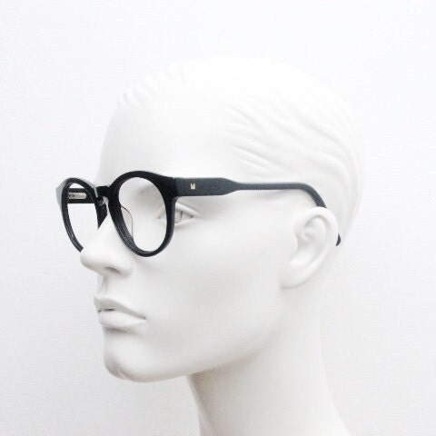 Will i Am round thick frame glasses model 30715554. Black gloss acetate optical frames with keyhole bridge. Prescription eyeglasses. RX