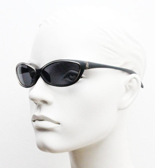 90s vintage curved wraparound sunglasses. Aerodynamic low profile transparent grey frosted frame. Minimal sporty shield design. NOS