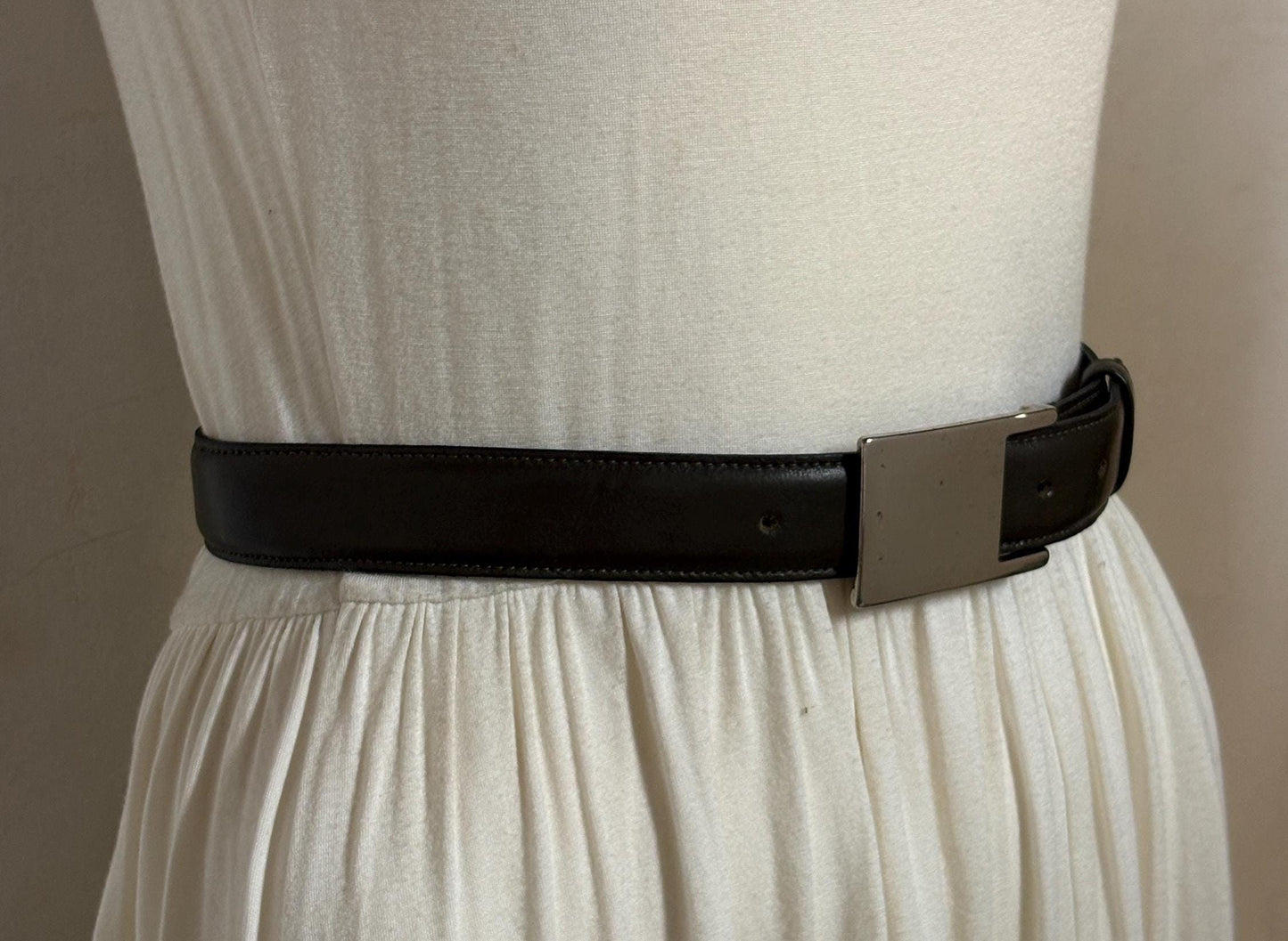 90s vintage smart trouser / jeans belt in dark green genuine leather with solid shiny chrome buckle. Made in France. NOS