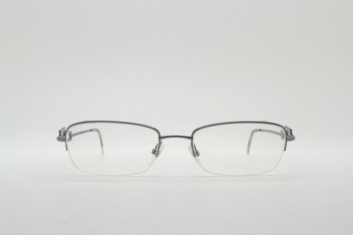 Gucci rectangular eye glasses made in Italy. Slim metal wire low profile optical half frame with diamante logo. Prescription eyeglasses. RX