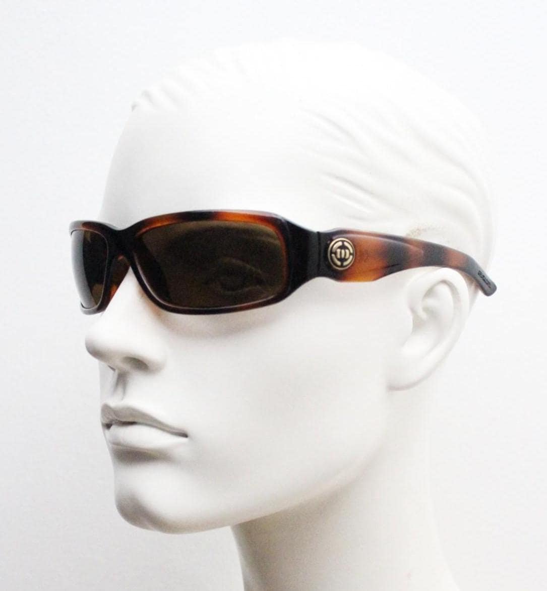 Y2K vintage curved wraparound sunglasses by Animal. Aerodynamic mottled brown gloss curved frame. Shield bug eye design. Biker shades. NOS