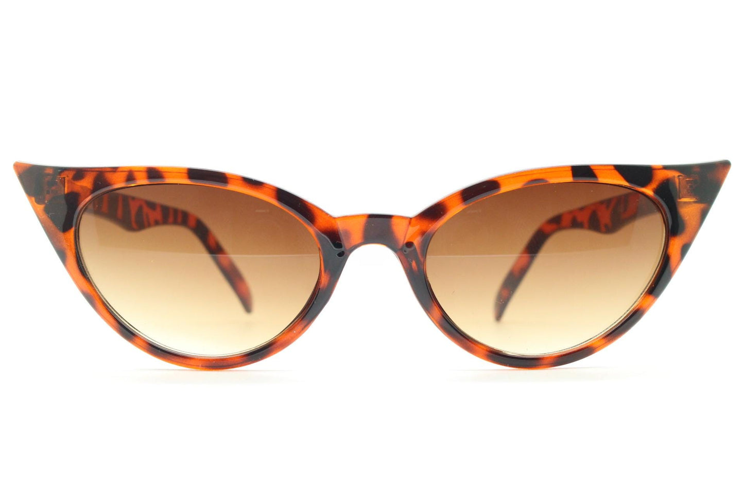 90s vintage pointed cat eye sunglasses. Tortoise slender frame with graduating brown lenses. Womens 50s design rockabilly, pin up