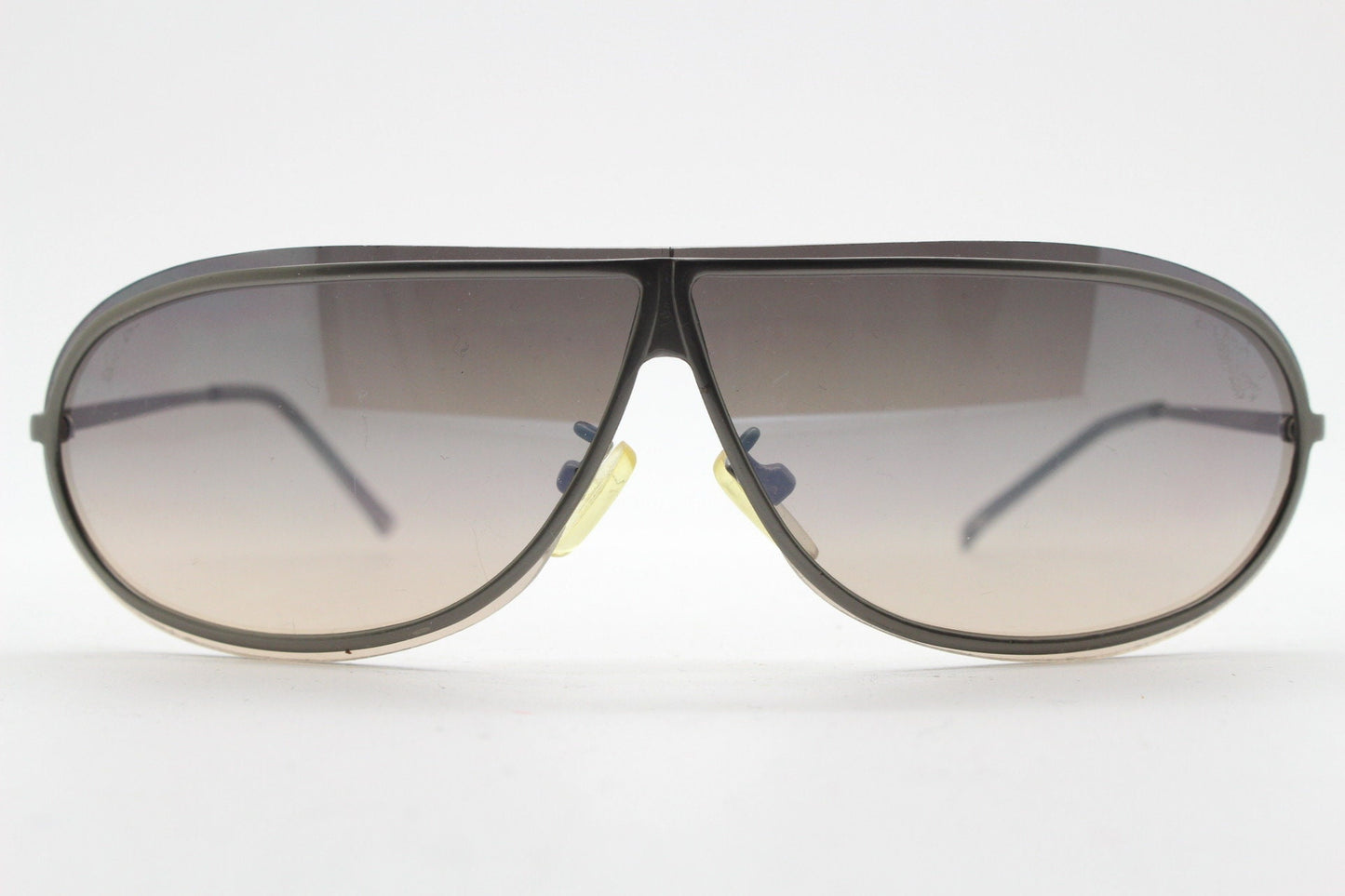 Y2K vintage visor aviator sunglasses. 2000's black low profile wraparound mono lens mini mask shield design with slim gunmetal arms. 00s NOS