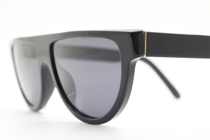 Retrosuperfuture thick flat top cat eye sunglasses hand made in Italy. All black gloss acetate frame. Vintage
