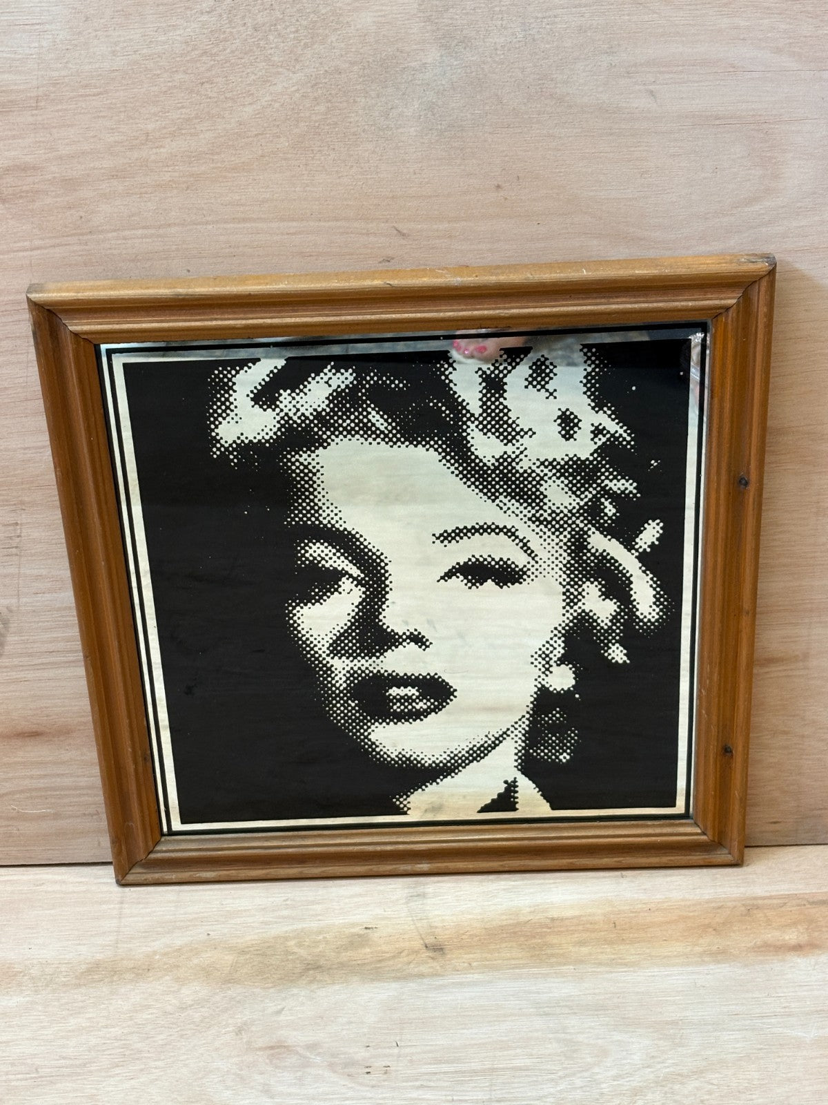 Large Marilyn Monroe vintage picture mirror. 1950s pose in solid wooden frame.