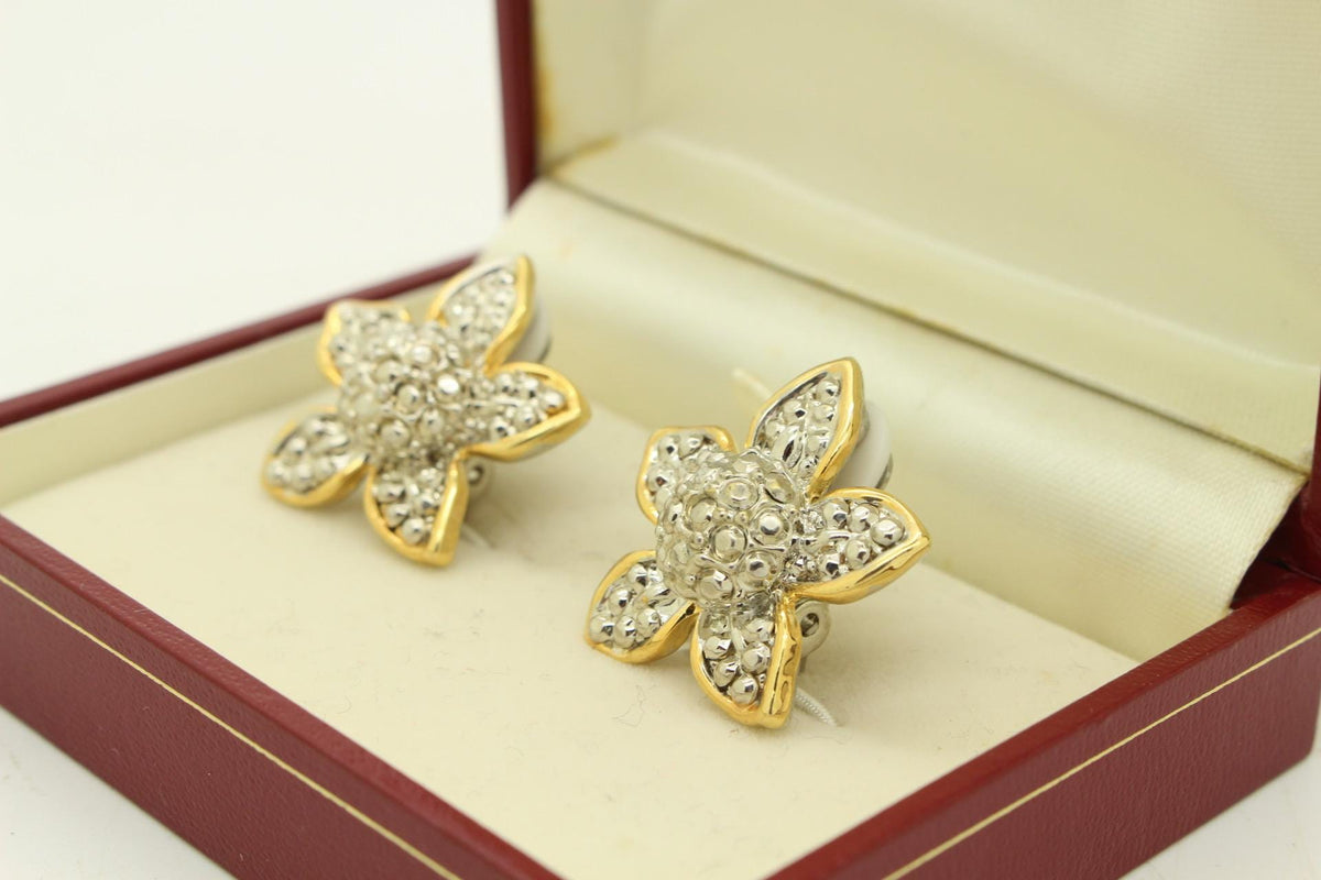 80s vintage gold and silver domed star earrings. Clip on. Textured surface to appear like small diamantes. With gift box. Rhinestone. NOS