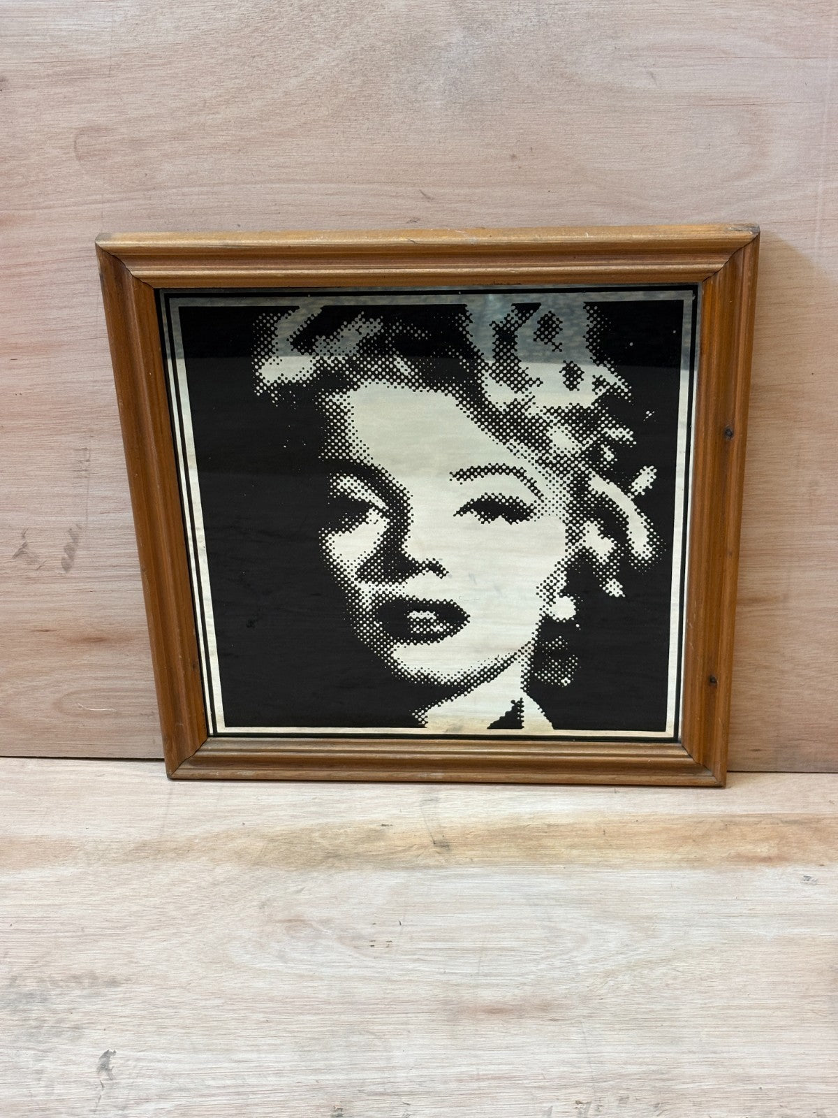 Large Marilyn Monroe vintage picture mirror. 1950s pose in solid wooden frame.
